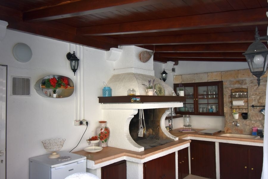 Cucina esterna con area grill