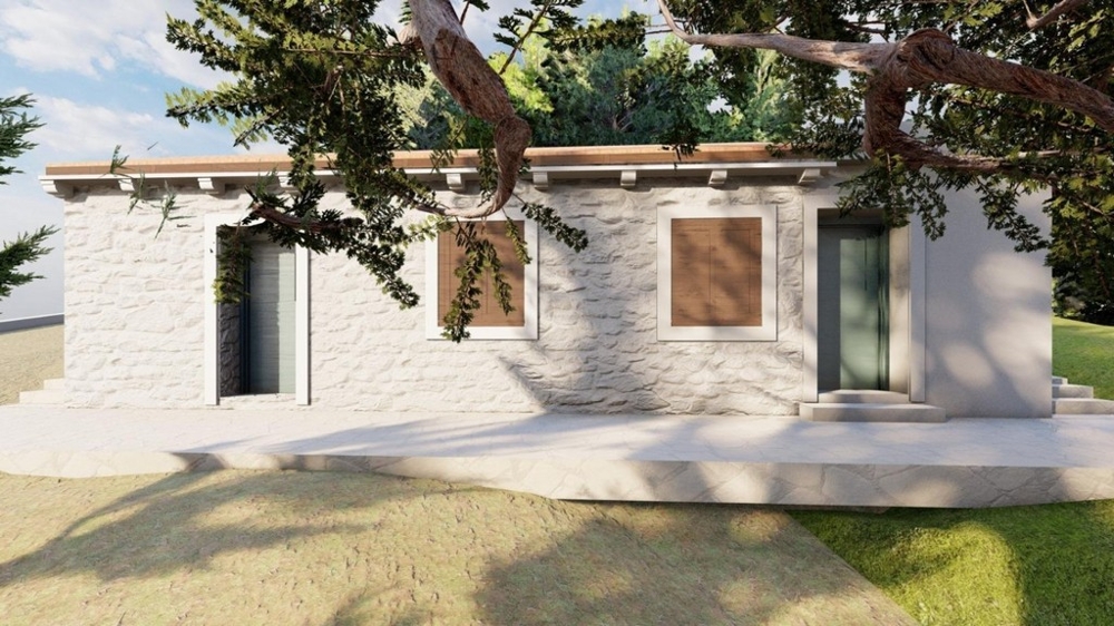 Casa in pietra ammodernata con facciata mediterranea e terrazza
