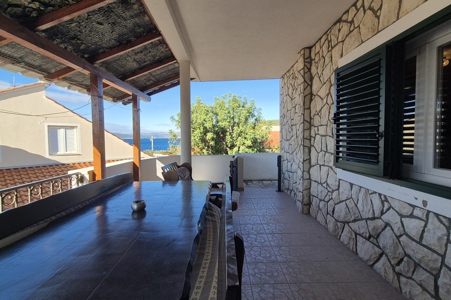 Terrazza coperta con posto a sedere