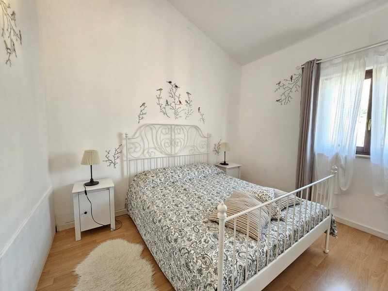 Camera da letto con letto matrimoniale in Croazia