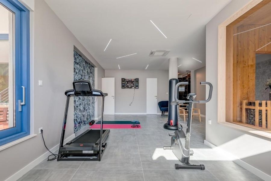 Sala fitness con sauna