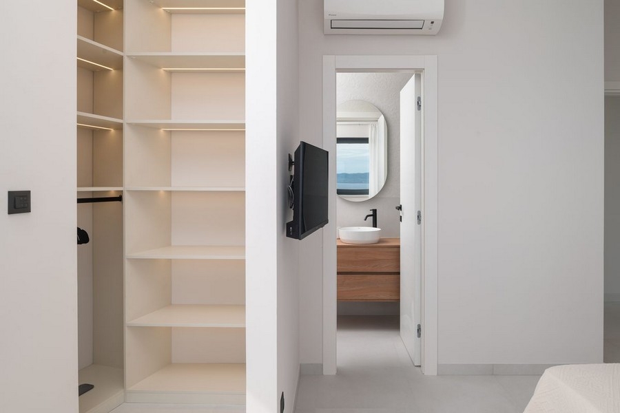 Camera da letto con cabina armadio e bagno privato