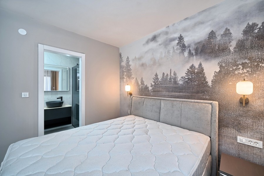 Camera da letto con bagno adiacente