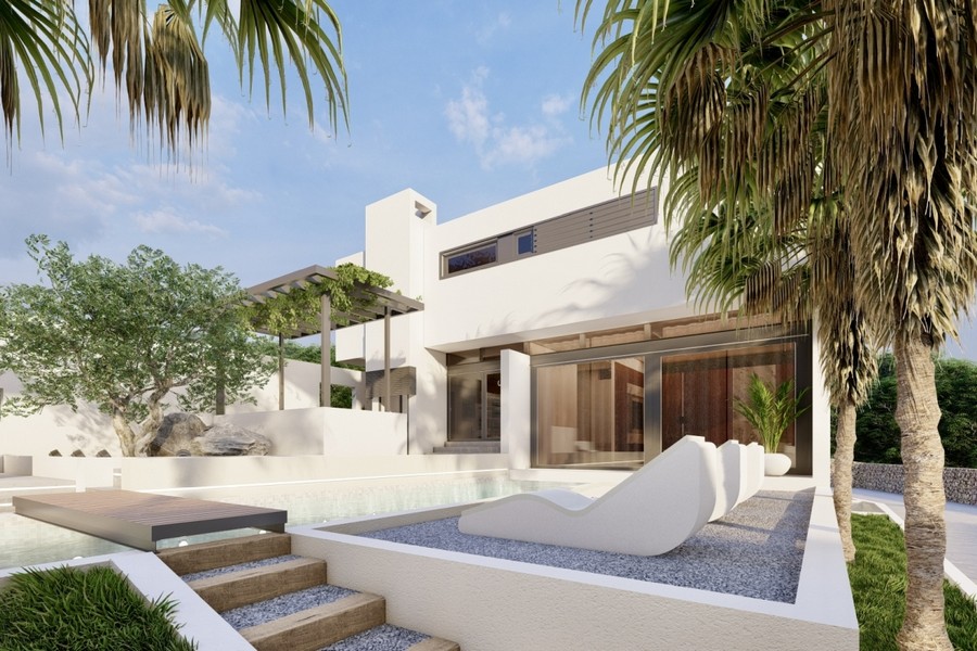 Zona piscina della villa con lettini e pergola