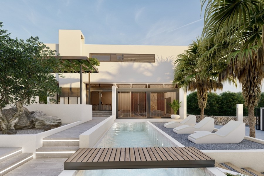 Villa con piscina e grandi vetrate sul giardino