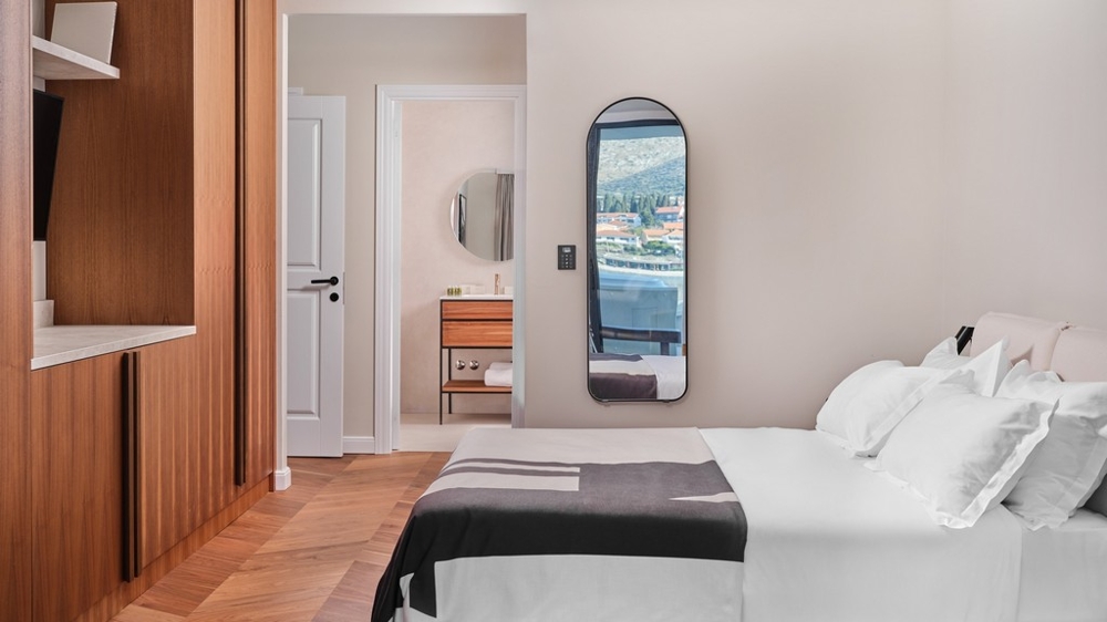 Camera da letto con letto matrimoniale e bagno privato