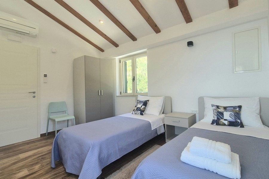 Camera da letto con due letti singoli
