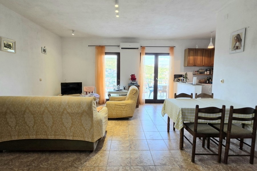Soggiorno con cucina a vista