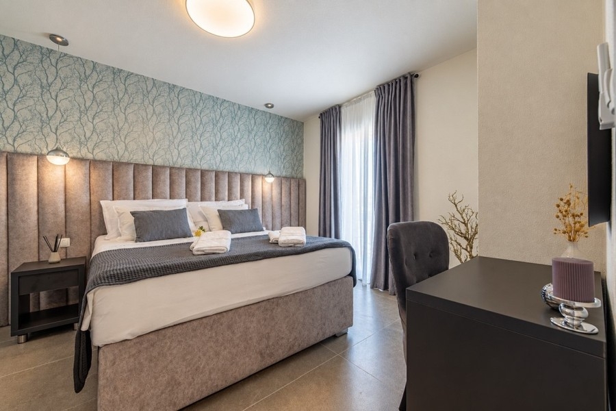 Camera da letto di una delle due ville a Rogoznica
