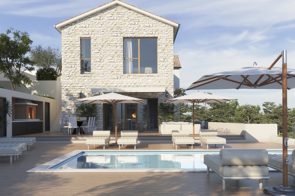 Terrazza della piscina con ombrelloni e lettini davanti alla villa