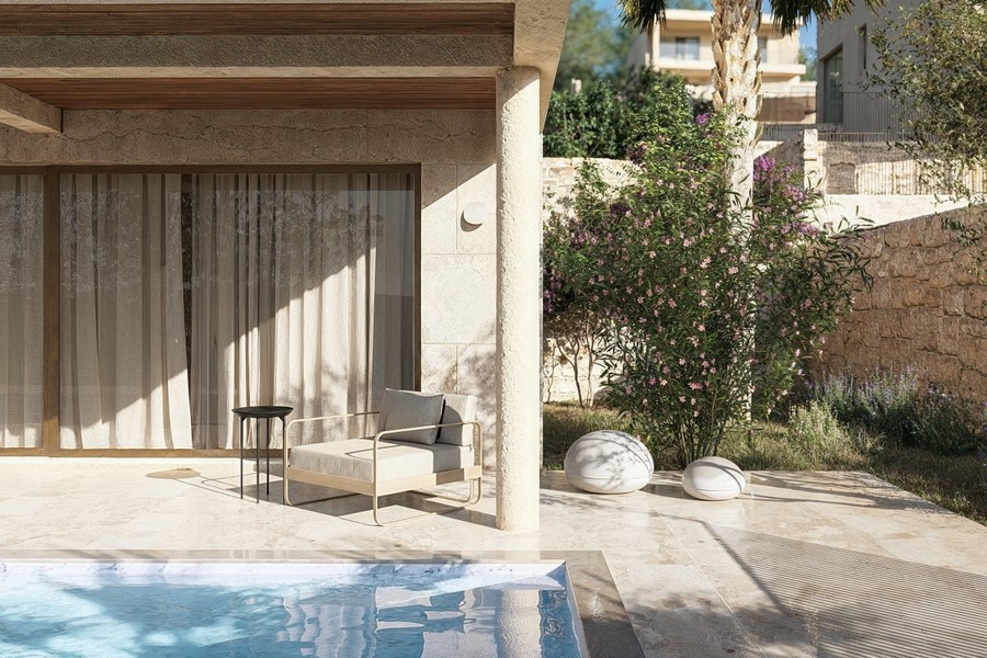 Angolo salotto sulla terrazza accanto alla piscina