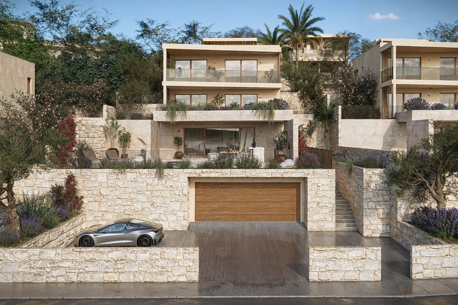 Vista della villa con garage e accesso