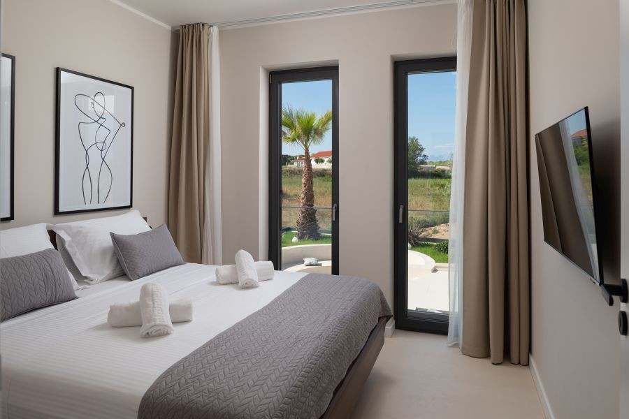 Camera da letto con porta sulla terrazza